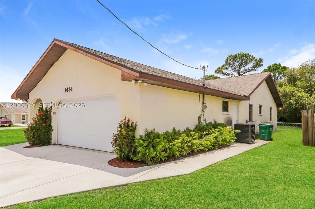 Photo of 1434 SW Broadview St, Port St Lucie, FL 34983 (MLS # A12066536)