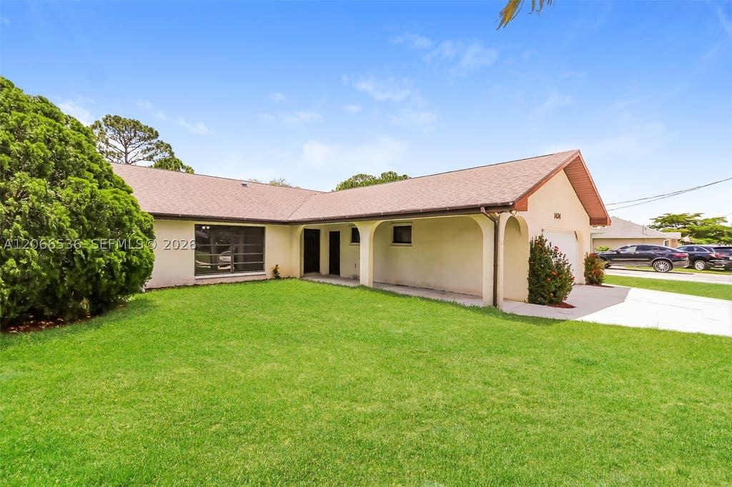 Photo of 1434 SW Broadview St, Port St Lucie, FL 34983 (MLS # A12066536)