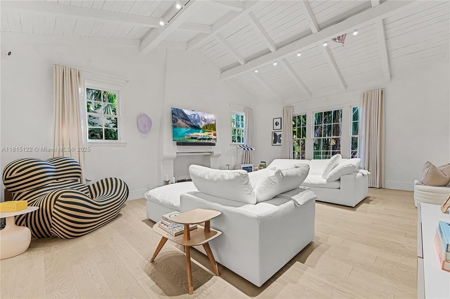 Just renovated 4 Bed / 4.5 bath on a 10,000 square foot lot on one of the most attractive streets in Mid-Beach. Stately Colonial-Mediterranean facade with excellent curb appeal. The giant great room features voluminous cathedral ceilings centered around an original fireplace. A flowing layout with defined yet open living areas includes a formal dining room, eat-in kitchen, and the desirable one-bedroom down /three-up allocation. The unique 200-foot deep lot allows for a backyard that seemingly goes on forever. Great location within a minute's walk to 41st Street.