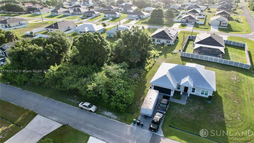 Photo of 4089 SW Mcintyre St, Port St Lucie, FL 34953 (MLS # A11822142)