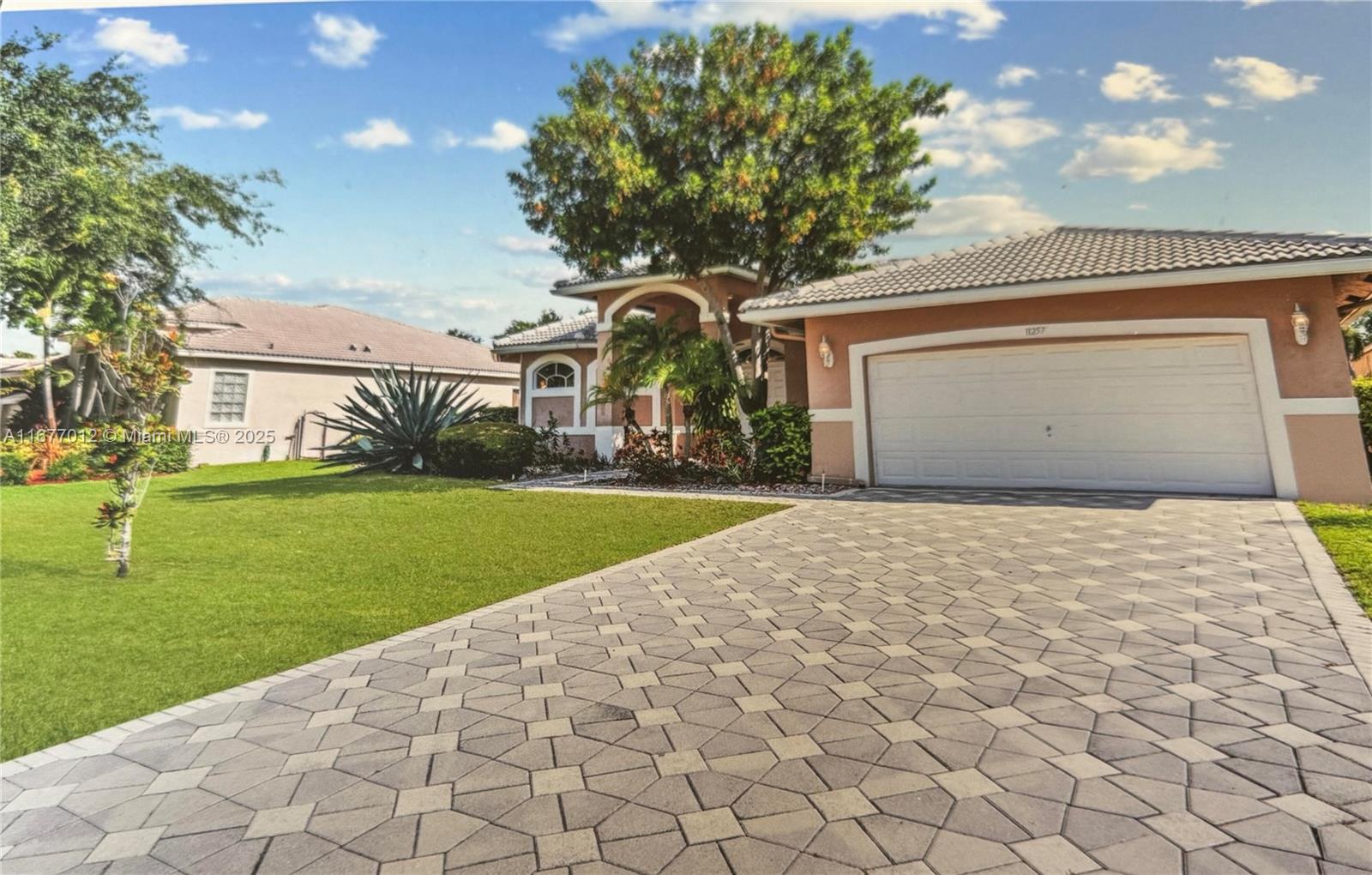 Welcome to this stunning property located in Coral Springs. This home features a spacious layout with ample natural light throughout. The modern kitchen is equipped with high-end appliances and plenty of cabinet space. The bedrooms are generously sized, providing comfort and privacy. Enjoy outdoor living with a beautifully landscaped yard and a refreshing pool. Conveniently situated near local amenities, this property has both luxury and convenience.