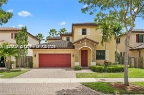 Come live at this stunning Mediterranean-style home. Extremely spacious and private, it features an amazing open kitchen and family room perfect for entertaining. Has a total of 4-bedroom, 3.5-bathrooms, an attached fully furnished in-law quarter that has its own private entrance, bathroom and laundry. All rooms are located upstairs. 2 car garage. Freshley painted and refreshed, this home hosts spacious living areas. Amazing community offers a pool, clubhouse and fitness center.