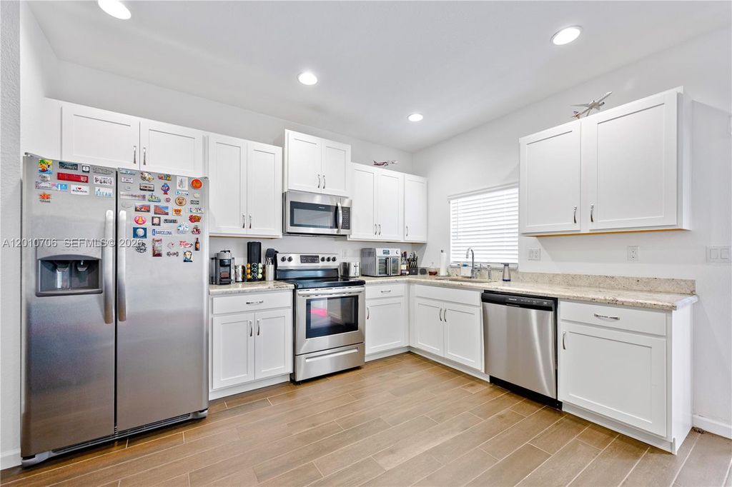 Photo of 1106 NW 40th Ter, Lauderhill, FL 33313 (MLS # A12010706)