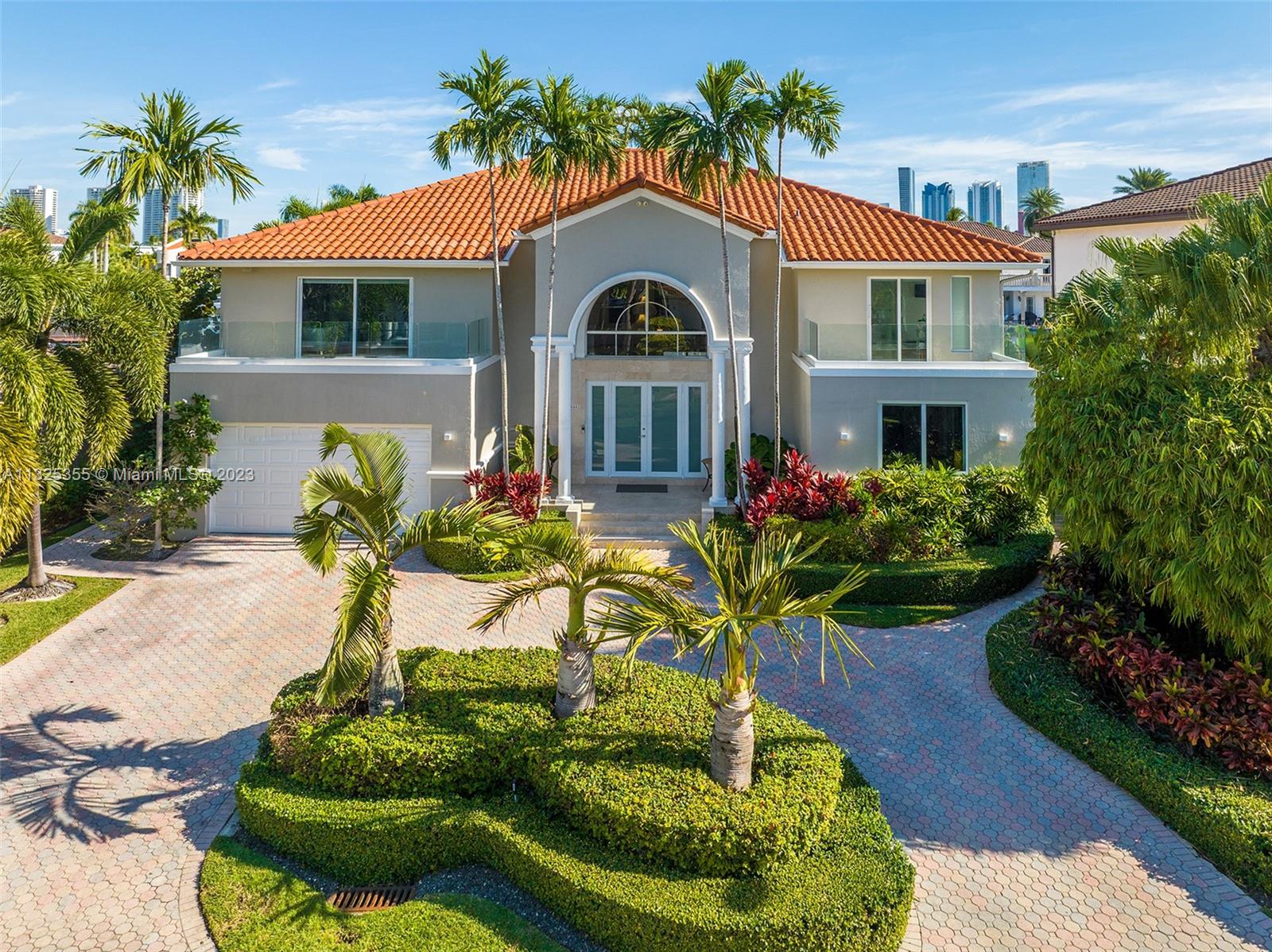 Welcome to your stunning waterfront oasis in the gated community of Eastern Shores! This magnificent property boasts a sprawling and elegantly appointed house, decorated by esteemed designer Maris Raffa. You are greeted by a grand foyer with soaring ceilings and an open floor plan that seamlessly flows from the formal living room to the formal dining room. The gourmet kitchen is a chef's dream, featuring top-of-the-line appliances, and a large center island. The home's luxurious master suite is a true retreat, a stunning walk-in closet that has been converted from a bedroom, spa-like bathroom, and private balcony. The outdoor living area is a boater’s dream, no fixed bridges, deep water,heated pool,80FT private COMPOSITE dock. Easy access to world-class shopping, dining, and entertainment.