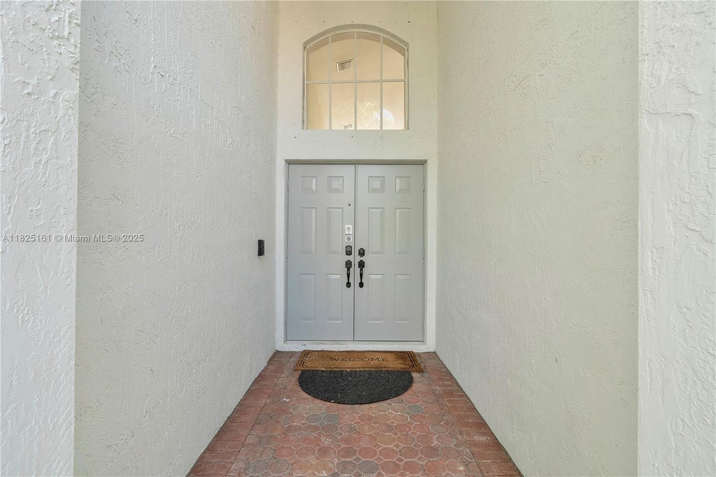 Photo of 4765 NW 122nd Dr, Coral Springs, FL 33076 (MLS # A11825161)