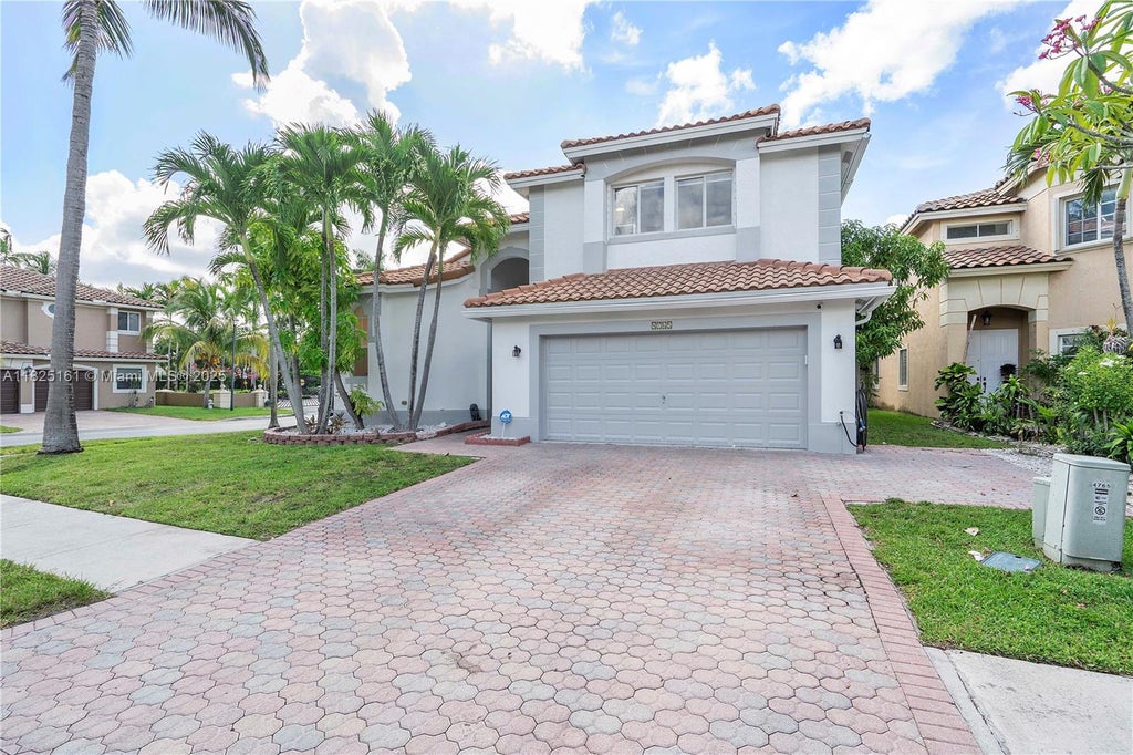 Photo of 4765 NW 122nd Dr, Coral Springs, FL 33076 (MLS # A11825161)