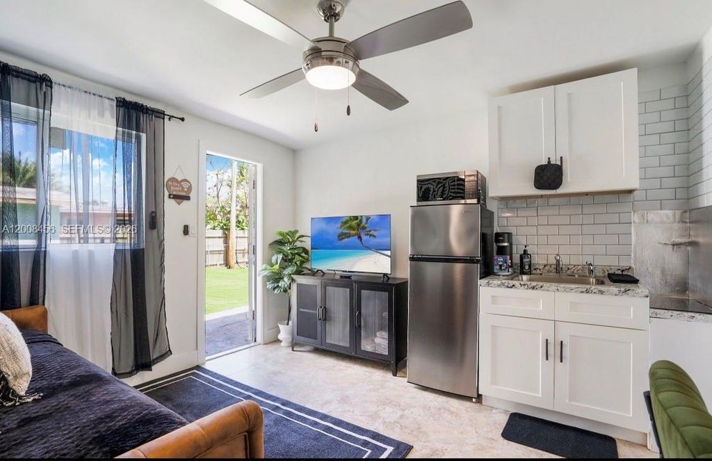 Photo of 919 NW 13th St #A, Fort Lauderdale, FL 33311 (MLS # A12008456)