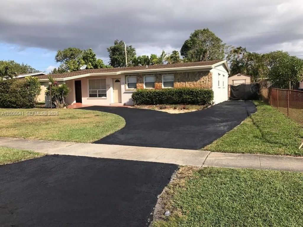 Photo of 1118 NW 43rd Ter, Lauderhill, FL 33313 (MLS # A12006641)
