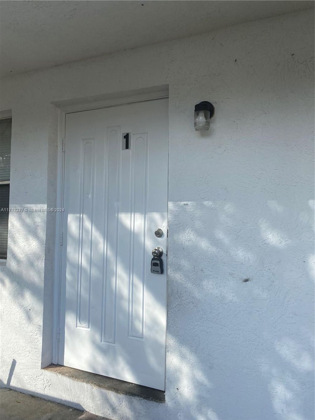 Photo of 1051 NW 27th Ave #1, Fort Lauderdale, FL 33311 (MLS # A11712337)