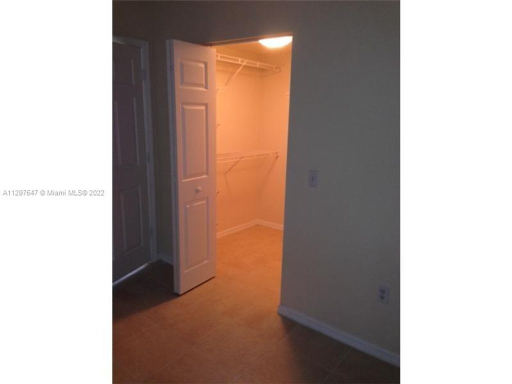 Photo of 2470 Centergate Dr #104, Miramar, FL 33025 (MLS # A11297547)