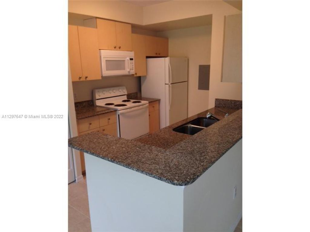 Photo of 2470 Centergate Dr #104, Miramar, FL 33025 (MLS # A11297547)