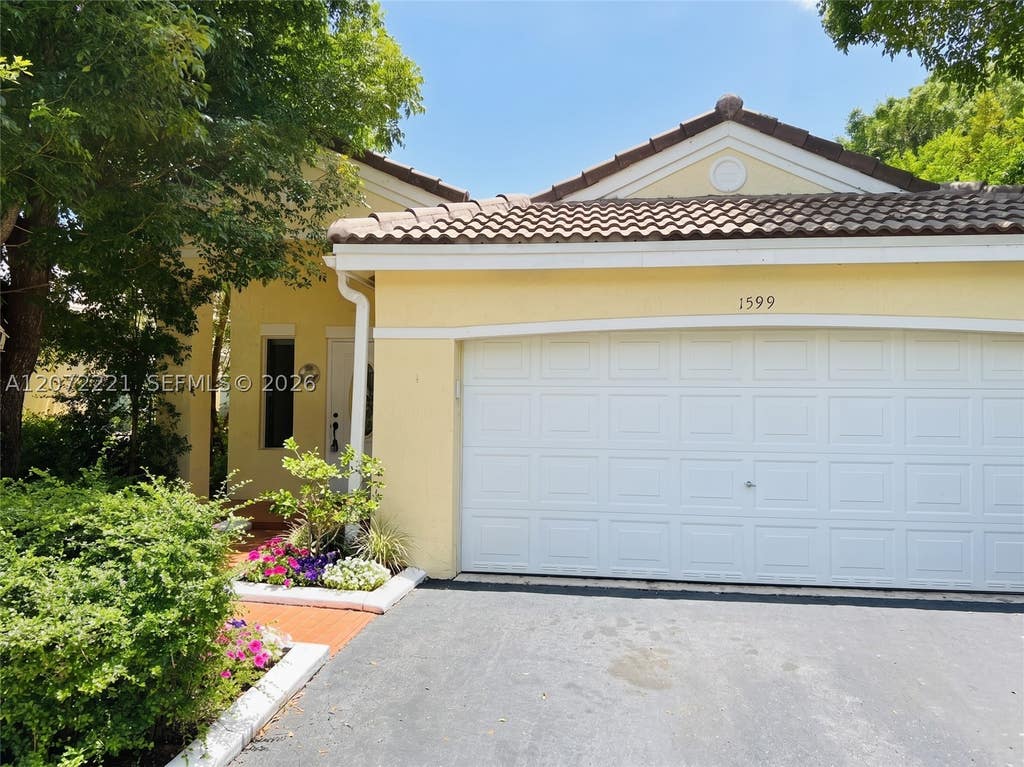 Photo of 1599 Palermo Dr, Weston, FL 33327 (MLS # A12072221)