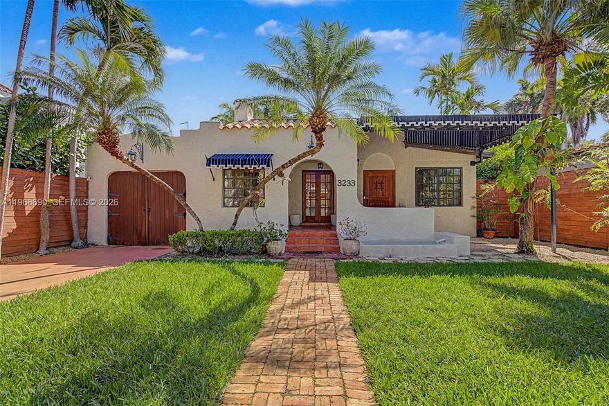Spanish Beauty with internal courtyard filling the house with light. Nestled on non-flood zone on desirable elegant street in Northeast Coconut Grove! Opportunity to live in Miamis’s favorite residential location! 1 block from bay, walk to marinas, parks, restaurants. European flair one story easy flow with wood floors and high ceilings. Marble bathroom with tub, remodeled kitchen, PVC plumbing, garden water well, mini spa/plunge pool, cheeky hut, Argentinian/Pizza grill and fish pond in a tropical lush backyard with room to grow. Multimillion house neighborhood.  2 bed/1bath + den and mail room in main building, **plus additional 380 sq ft 1bed/1bath guest cottage/ inlaws/ maid quarters/rental unit with separate entrance, W/D and kitchenette! Grandfather in, not included in the sq.ft. An opportunity not to miss. 24 hrs previous appointment required. Only prequalified buyers.