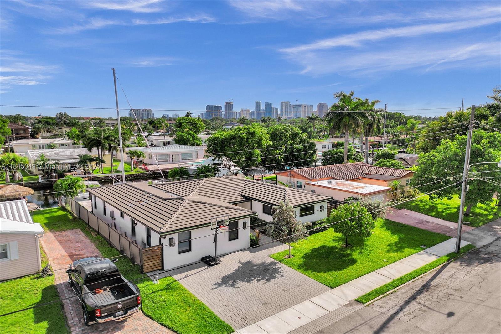 This 4 bedroom/office/3 bathroom UNRESTRICTED OCEAN ACCESS POOL HOME in Citrus Isles has great advantages as it's minutes away from downtown Las Olas, the international airport, many beaches, Hard Rock Casino, and much more! The house is designed with safety and durability in mind, as all the windows are storm/impact rated, the appliances are in perfect condition, adding a touch of modern elegance to the home. An exciting feature is its ocean access and the inclusion of a new dock and shore power. Bring your boat!(up to 32 FT) The combination of its contemporary design, convenient location, pool, and ocean access make it an ideal place to relax and enjoy the best that Fort Lauderdale has to offer.