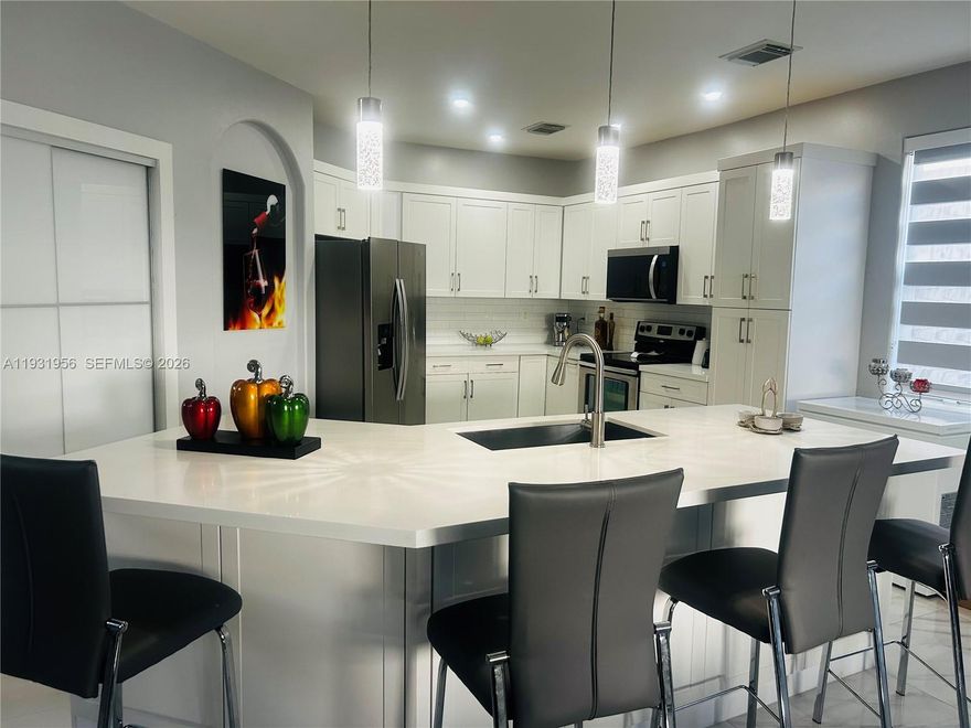 Looking for a home that truly has it all? This beautifully maintained and fully remodeled 6-bedroom, 5-bathroom residence offers modern comfort and versatility. The sleek kitchen features stainless steel appliances, complemented by modern lighting and updated fixtures throughout. Enjoy vaulted ceilings and a spacious, grand primary suite designed for relaxation. Modern and spacious outdoor kitchen. The converted garage offers a private entry, ideal for an extended family, guests, or potential rental space. The oversized driveway and manicured landscaping enhance both functionality and style. Situated in a highly desirable location, close to top-rated schools, shopping, and major highways. 
A true gem—don’t miss this opportunity.