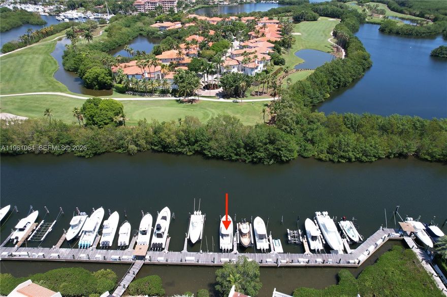 Discover the perfect boat slip at the prestigious Royal Harbour Yacht Club Marina, offering prime location, protection, and convenience for boating enthusiasts AND you do not have to own a home to purchase the slip. This slip measures 42 feet in length and 13.10 feet in width, providing ample space. Access to water and electricity connections, ensuring a seamless boating experience. This sought-after marina offers an unbeatable opportunity to explore premier destinations as it's in the middle of Biscayne Bay, the Florida Keys, Elliott Key, and Nixon Beach Sandbar. One of the few slips with a pier! 24/7 Surveillance & access to Security Cameras! Don’t miss your chance to secure this prime waterfront spot—act now before this opportunity “slips” away! (Please note: Association holds the Right of First Refusal.)