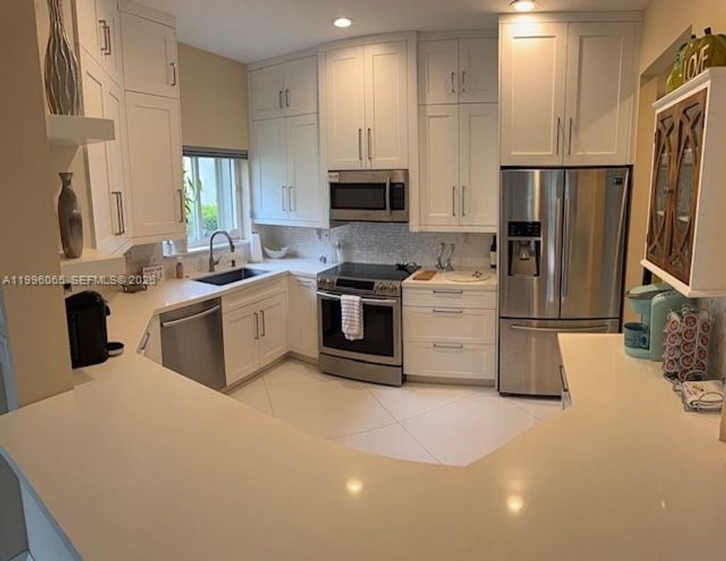 Photo of 5656 NW 127th Terrace #5656, Coral Springs, FL 33076 (MLS # A11996065)