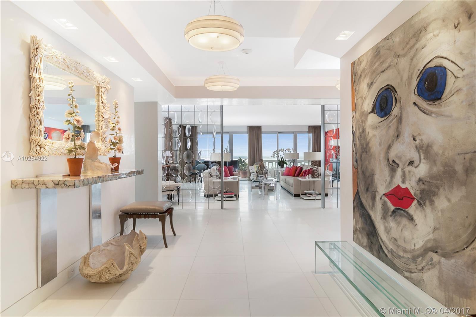 A MANSION IN THE SKY!! COMPLETELY REMODELED WITH EXQUISITE APPOINTMENTS. ROUGHLY 2400 SF OF OUTDOOR TERRACES! CORNER APARTMENT WITH SPECTACULAR VIEWS OF DOWNTOWN MIAMI, BISCAYNE BAY AND THE OCEAN. A MUST SEE!! INCREDIBLE SERVICES THROUGHOUT THE BUILDING. TENNIS COURT, FITNESS CENTER, FULL RESTAURANT, PRIVATE DOCK, JOGGING PATH AND POOL.