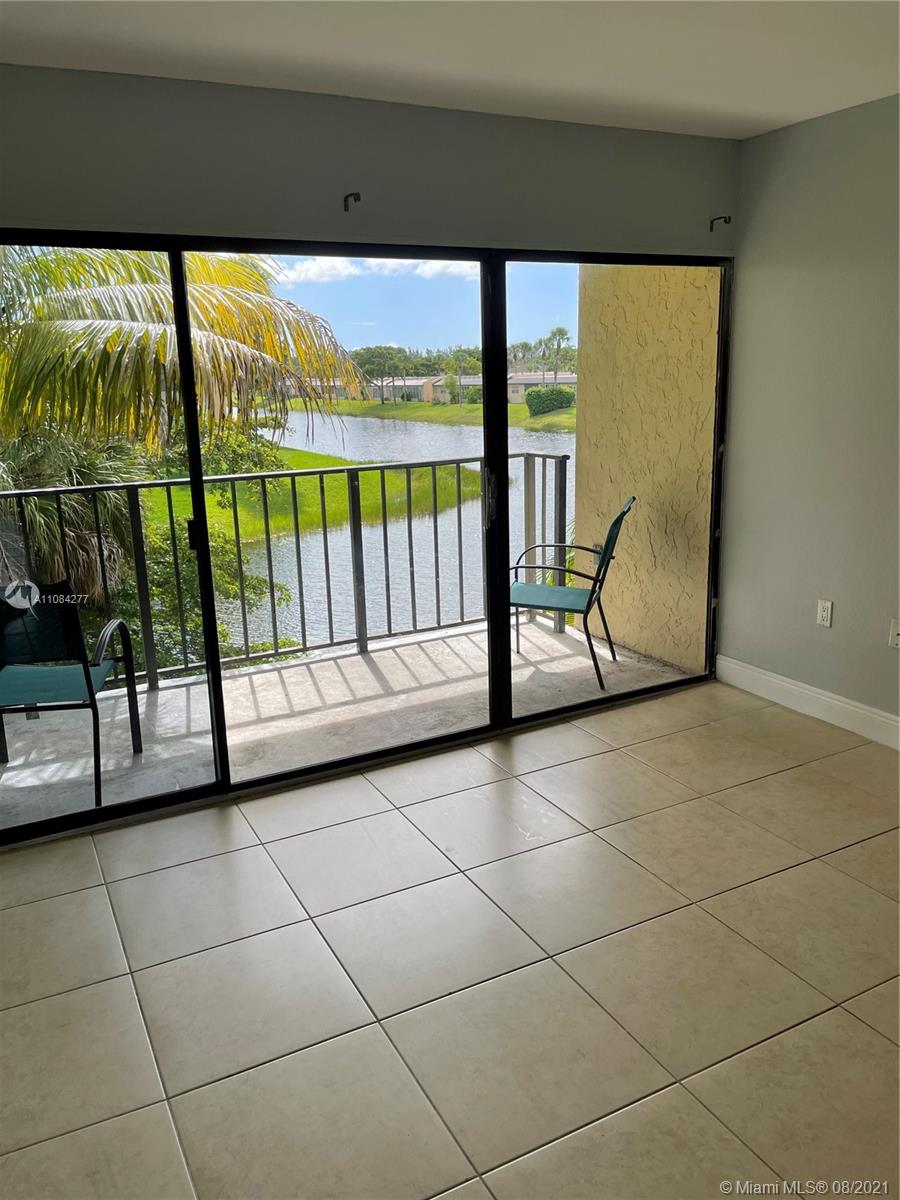 Palm Beach Grande is a non gated community located in West Palm Beach. Second floor condo with lake view has 2 bedrooms and 2 bathrooms. Kitchen with granite countertops. Tile floors. Full size washer and dryer. Open covered balcony with sliding doors overlooks lake view. Community includes play area, pool and tennis courts. Near major roads, shopping, highways, restaurants, beaches, parks. airport and more