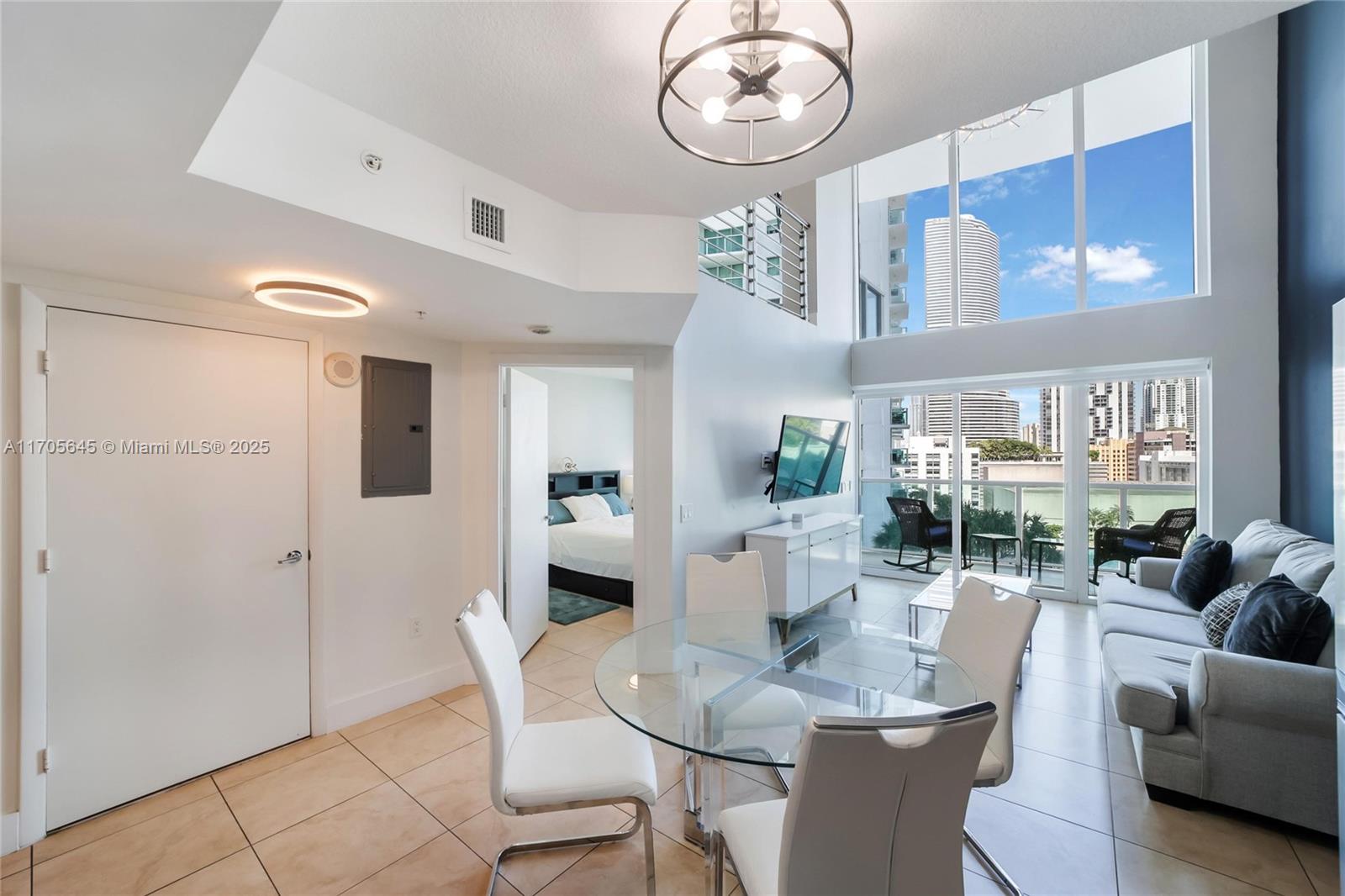 Fully FURNISHED Spectacular 2 bedrooms + 2 full baths unit @ Brickell on the River South with a LOFT style floor plan. With 2 parking spots!!! Open Kitchen with stainless Steel Appliances and impact windows. Large balcony downstairs overlooking the city skyline, the River and the Bay and Second balcony upstairs. Building is located next to Metro Mover & many restaurants. Few Blocks from Brickell Citi Center & Mary Brickell. Valet Parking. 24 hours Lobby Attendant. Lap and resort-style pools, hot tub, poolside BBQ grills, 2 story fitness center, club rooms with billiards tables and kitchens, sauna, business center, steam room. Call listing Agent Jorge Ospina.