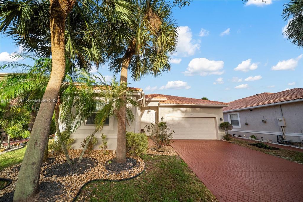 Photo of 7862 NW 62nd Ter #7862, Parkland, FL 33067 (MLS # A11977429)