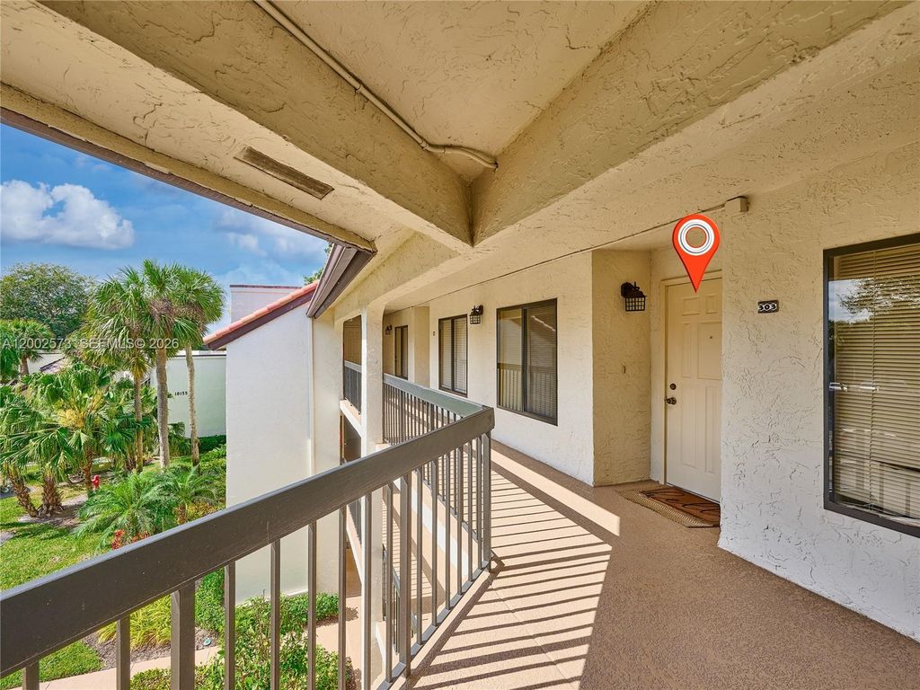 Photo of 10143 Mangrove Dr #303, Boynton Beach, FL 33437 (MLS # A12002573)