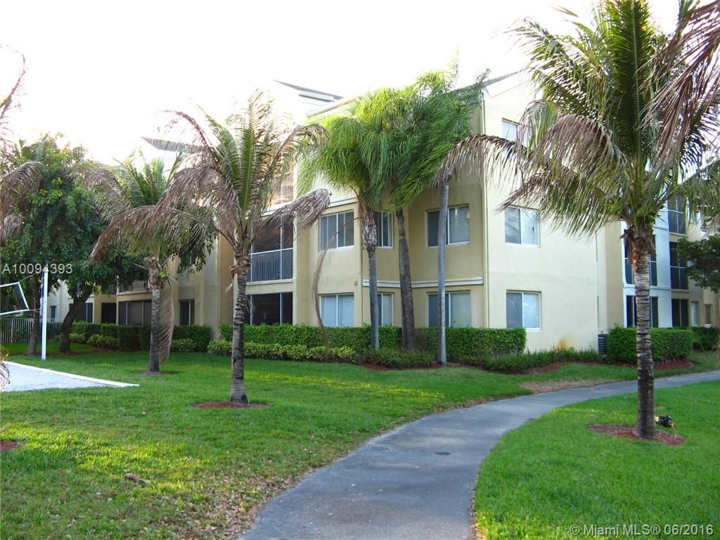 BEAUTIFUL 2/1, VERY BRIGHT UPGRADED CORNER UNIT. OUTSTANDING KITCHEN WITH GRANITE COUNTERTOP, STAINLESS STEEL APPLIANCES, VAULTED CEILINGS, BIG MASTER WITH WALK-IN CLOSET. SCREENED BALCONY WITH GORGEOUS TILE FLOOR. BRAND NEW A/C AND WATER HEATER. WORK VEHICLES ALLOWED. LOTS OF AMENITIES: CLUBHOUSE, GYM, POOL, GATED COMMUNITY. WATER INCLUDED. CLOSE TO TURNPIKE/COMMERCIAL BOULEVARD. MUST SEE!!
