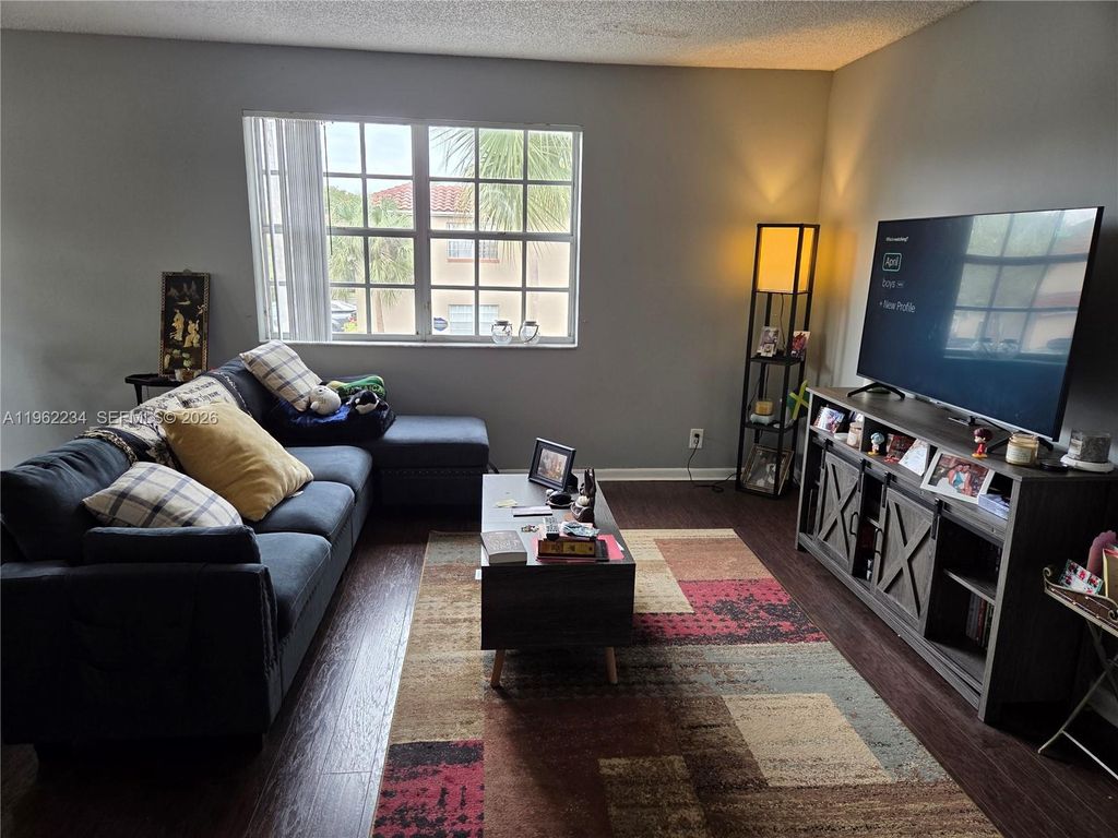 Photo of 8710 SW 3rd St #201, Pembroke Pines, FL 33025 (MLS # A11962234)