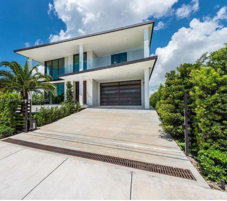 This luxury waterfront home, built in 2022, offers stunning sunsets and views of Miami’s skyline over Biscayne Bay. Featuring a double-height living room, floor-to-ceiling windows, gourmet kitchen, bayfront primary suite, 6 guest bedrooms with ensuite baths, pool, summer kitchen, new seawall, 2-car garage, large terraces, rooftop, and 60-ft dock. Located in North Bay Village, a rapidly growing area with a major 13-acre development underway, this home is perfect for luxury waterfront living. Contact listing agent to schedule your exclusive showing appointment. 
More photos coming soon.