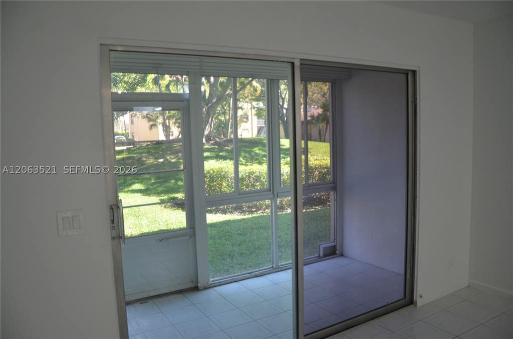 Photo of 1351 SW 125th Ave #103S, Pembroke Pines, FL 33027 (MLS # A12063521)