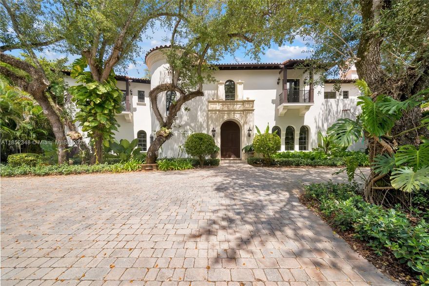 This stunning two-story Italian villa, thoughtfully designed by Giorgio Balli, is situated in the exclusive Ponce Davis neighborhood. Boasting 7 bedrooms and 6 full bathrooms along with 2 half-bathrooms, this gated estate offers 9,071 square feet of elegant living space, a two-car garage complemented by an incredible 2 story guest cottage . The grand first floor welcomes you with a double-height foyer, centered around a striking spiral staircase that serves as a captivating focal point and architectural centerpiece. Thoughtful design features gourmet kitchen, spacious family room, formal dining and a movie theater The outdoor serene oasis includes a summer kitchen,  basketball court, and children’s playground. This estate caters to discerning clients seeking luxury, privacy, and comfort.