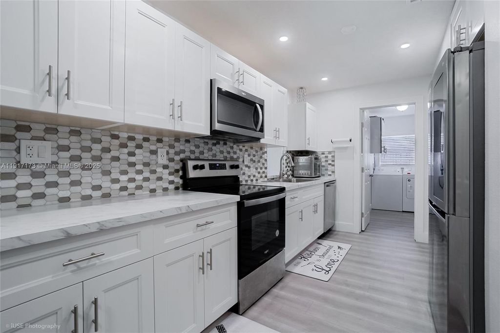 Photo of 1211 NW 50th Ave, Lauderhill, FL 33313 (MLS # A11917173)