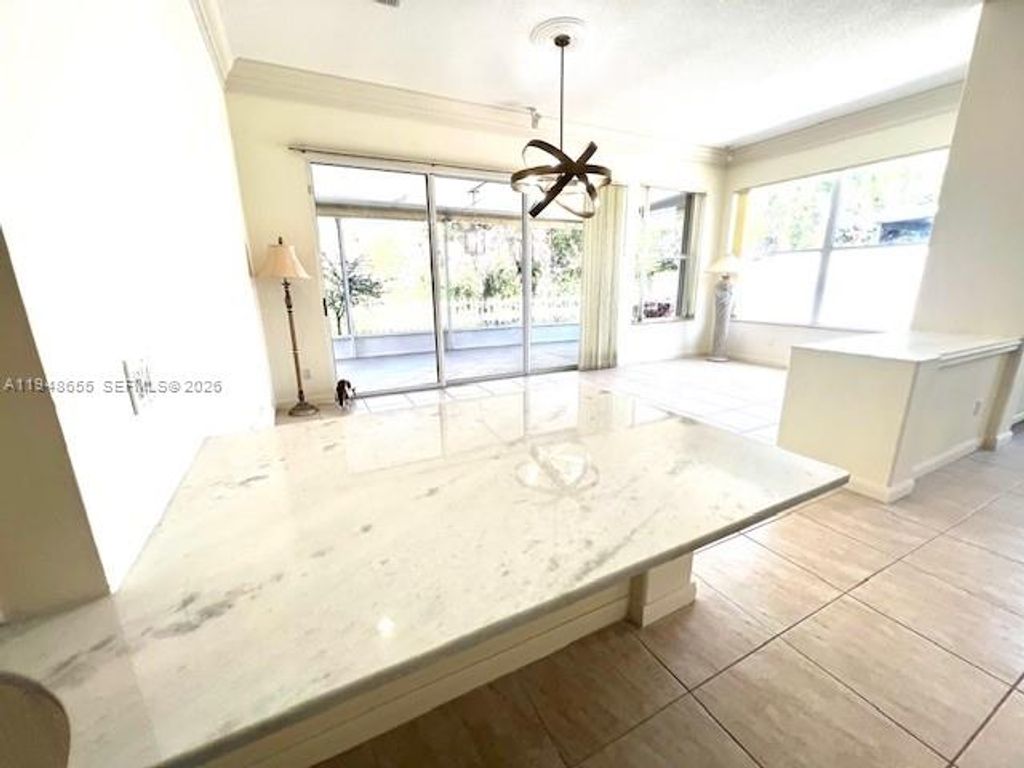 Photo of 7625 SE Bay Cedar Cir, Hobe Sound, FL 33455 (MLS # A11948655)