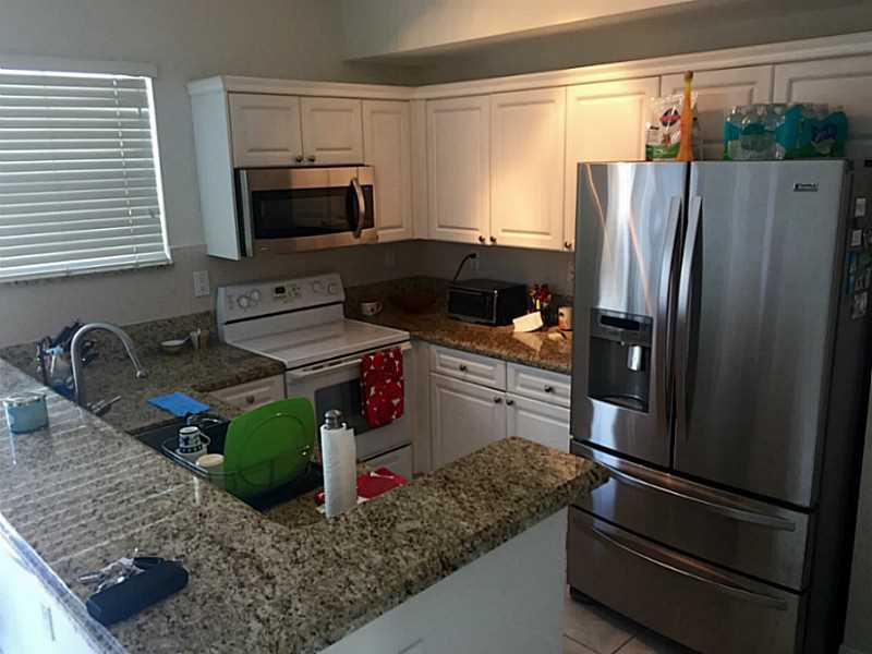 Gorgeous remodeled two-bedroom townhouse in the heart of Doral with a lovely lake view. New stainless steel appliances, including washer/dryer and two master-bedroom suites with completely remodeled bathrooms. Spotless home with no detail spared, close to great schools, several supermarkets and major expressways. Broker must accompany - need 24 hour notice. Property available October 1st. If Pet owner will ask for deposit.Tenant's insurance required.