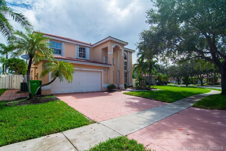 Sanctuary on the lake! An amazing home moments from the Sawgrass in Sunrise! This 5 bedroom, 3 bathroom home thas everything one should ask for. Completely remodeled kitchen within the last month with some brand new appliances. All three full bathrooms have been updated within the last month & the interior professionally painted. The natural lighting in this home is breathtaking with vaulted ceilings & windows that showcase the most picturesque view of the pool, which overlooks the lake. This is the ultimate home to spend time with family & entertain, with no worry about space, as the backyard seems endless! One bedroom downstairs makes it perfect for guests or in-laws too! Accordion shutters make it so easy when needed. Close to highways, shopping & more. An absolute must-see!