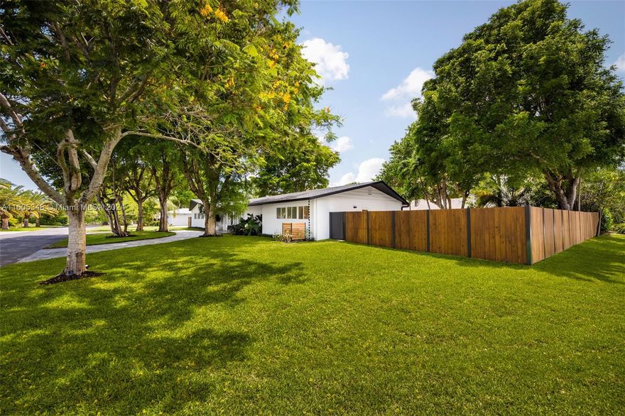 Lovely home on a tree-lined street in coveted North Pinecrest. Recent total renovation (fully permitted) including new: roof, electric, plumbing, impact glass & Smart Home features throughout. Light-filled, open living spaces w/ European oak flooring & a modern vibe. Stunning new kitchen has custom cabinetry, quartz countertops, JennAir appliances, large walk-in pantry + a cooking island. Ideal floorplan offers 4BR/3BA+ office+ bonus room. Additional home features: custom bar w/ 2 wine refrigerators, custom closets throughout, new bathrooms w/imported vanities & glass enclosed showers, Surround Sound, security cameras & laundry room. Enjoy outdoor living in the ultra-private backyard with terrace, built-in grill & tropical pool. Walk to Royal Palm Tennis Center & close to A+ rated schools.