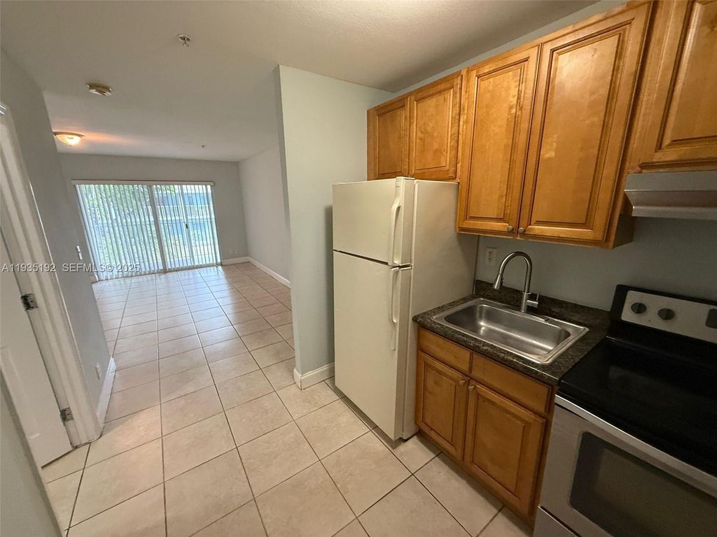 Photo of 4271 NW 5th St #253, Plantation, FL 33317 (MLS # A11935192)
