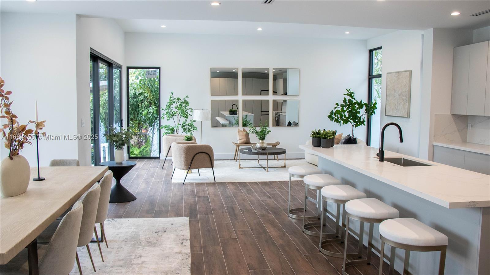 Breathtaking 3,590 sqft Brand New Two-story Single Family Home in Prime location, less than 5 mins away from Brickell, 3 blocks away from The Roads, and less than 7 mins away from Coconut Grove! New construction with an open floor plan, Double-door entry, 4 beds, 3.5 baths. Features a modern design, natural light in all rooms, high-end finishes, modern appliances, European kitchen, Calacatta quartz countertop, walk-in pantry, 10" ceiling height, all doors are 8' height (including closet doors). Spacious bedrooms, comfortable living spaces, private pool, a covered terrace with overhand (with two different full-stacking-sliding-doors access), BBQ built-in on the terrace. Large garage (with workshop) and additional uncovered parking inside property fence. Security alarm and Cameras pre-wired.