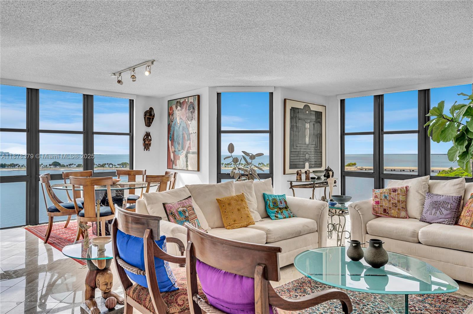 Enjoy beautiful Biscayne Bay views from every room in this spacious, rarely available 08 line condo, (the largest line in the building with 2,124 sf). Start your day in your eat-in kitchen breakfast nook overlooking the marina and Key Biscayne bridge as boats sail by. New floor-to-ceiling impact glass windows flood the home with natural light and amazing views. The unit comes freshly painted with updated kitchen and bathrooms, spacious laundry/utility room, enclosed balcony, new zebra shades and 2-assigned underground parkings. Amenities include: valet, 6 tennis courts, outdoor & indoor playgrounds, BBQs, pools, jacuzzi, gym, indoor racquetball & squash courts, 24-hr security, covered dog run, storage space, recreation room, beauty salon, in-house management, marina, mini-market & more.
