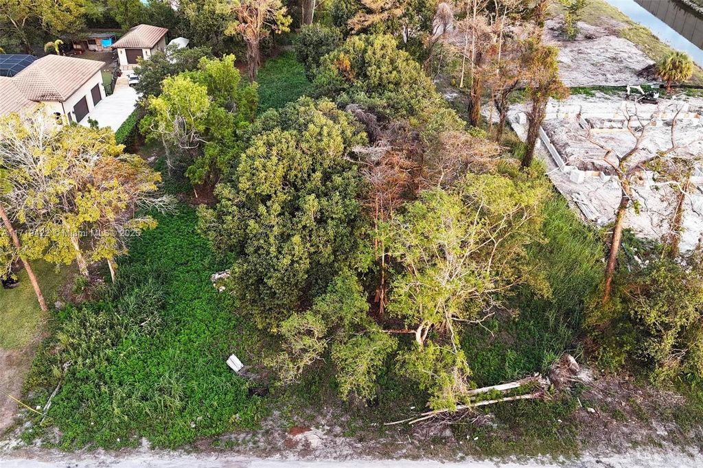 Photo of 5756 NW 63rd Way, Parkland, FL 33067 (MLS # A11719422)