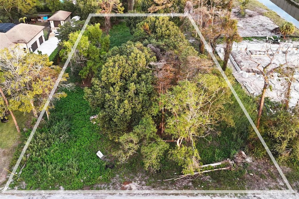 Photo of 5756 NW 63rd Way, Parkland, FL 33067 (MLS # A11719422)