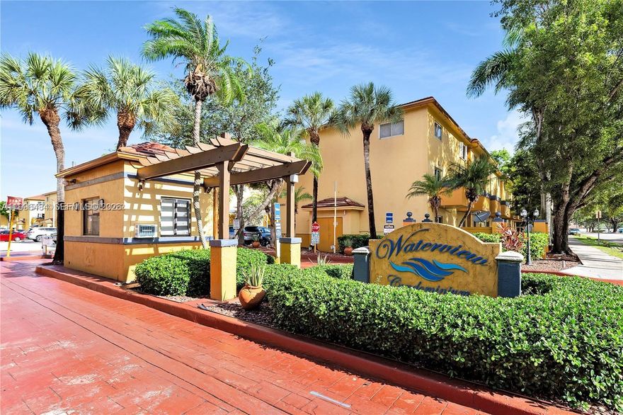 This amazing gated community is close to everything. First floor entrance, 2 assigned parking spaces. Ceramic Tile throughout, washer and dyer in the unit. Community pool, children pay area, and much more. Unit is ready to move in.