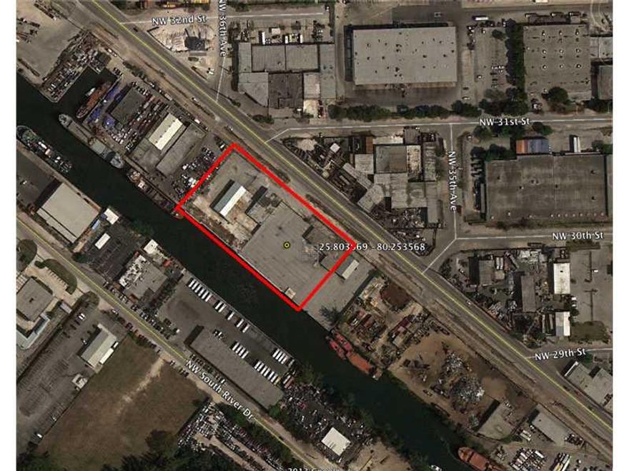 Miami River heavy industrial use site available. Located on 2.59 acres (112,820). Suitable for commercial freighter terminal, concrete plant, truck terminal or any heavy industrial use. Located in unincorporated Miami-Dade County at the end of the industrial section on the Miami River. Active CSX rail in front of property with rail spur access. 3 buildings on the site with a wide open area for containers, parking or additional buildings. Crane pad in place. 450 Linear feet on the Miami River.