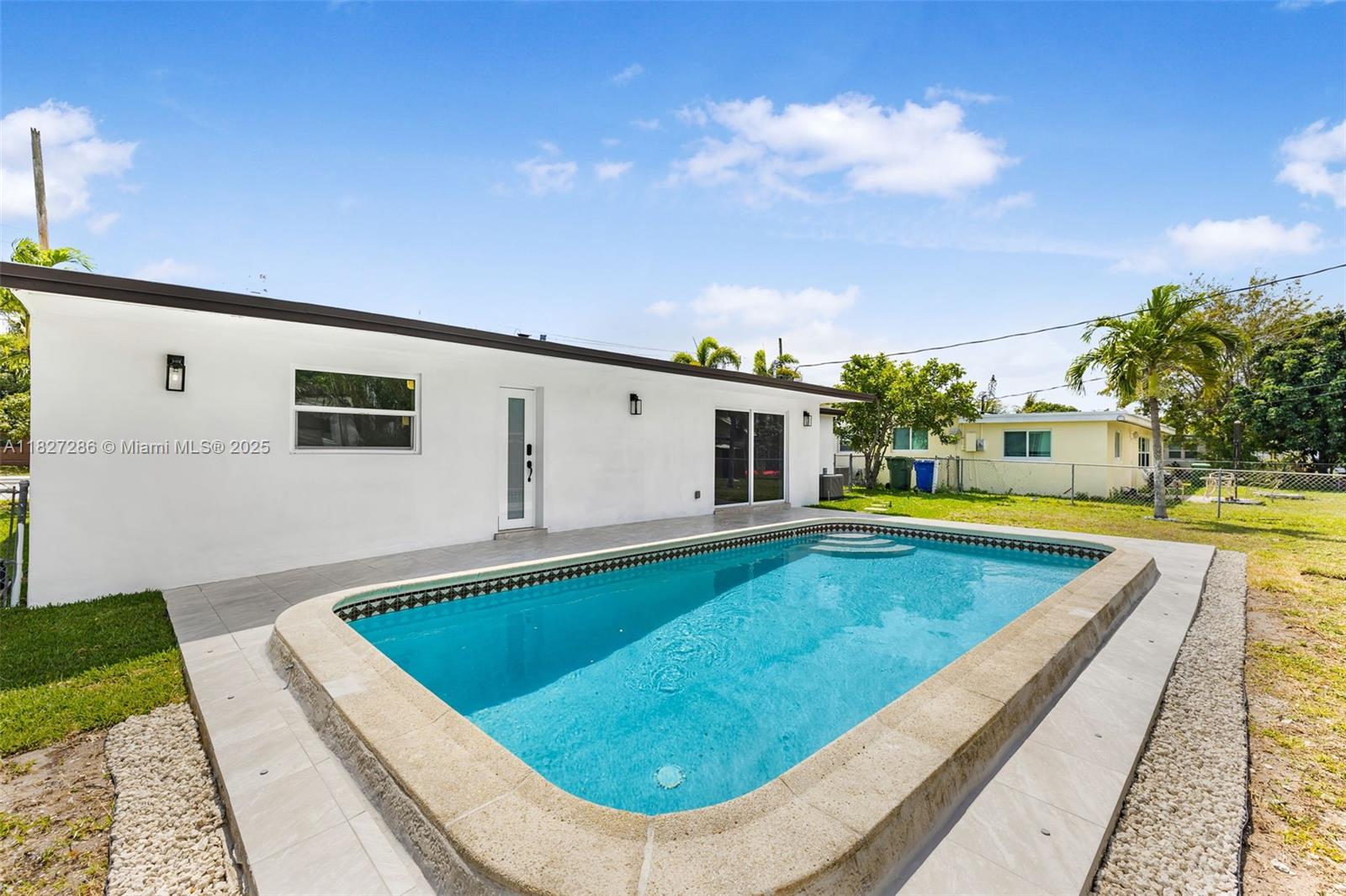 Welcome to this beautifully renovated 4-bedroom, 2-bath single-family home in the heart of Margate! This spacious property features an open floor plan, a stylish modern kitchen with all-new appliances, and a large living area perfect for relaxing or entertaining. Enjoy added comfort with hurricane-impact windows and doors, a dedicated utility/laundry room, and a private backyard oasis with a sparkling pool, expansive patio, and plenty of green space. Located on a 7,350 sq. ft. lot in a quiet, family-friendly neighborhood close to shopping, dining, parks, and top-rated schools. Ready for immediate occupancy — schedule your showing today!