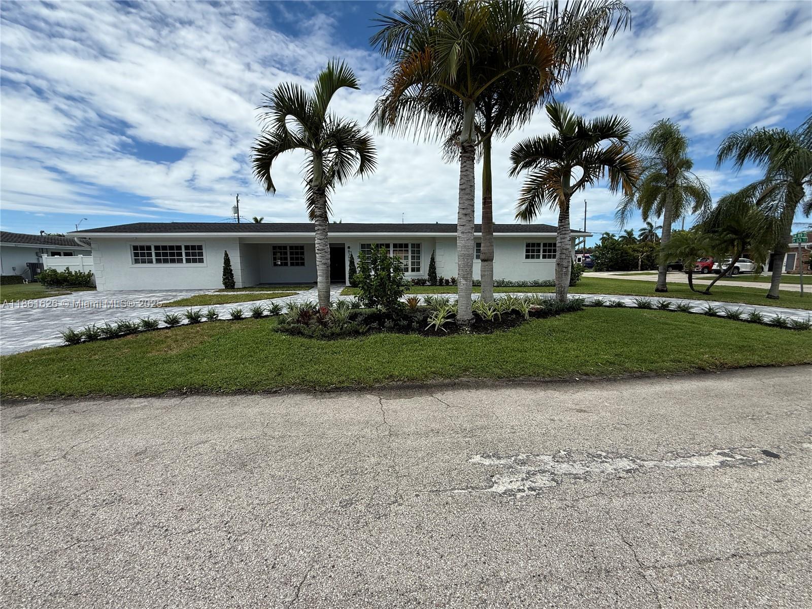 A rare find in east Kendall! This 4-bedroom, 3-bath pool home sits on an 14,640 Sq.Ft oversized corner lot, offering both privacy and space for all your needs. The fully fenced backyard features a 6' privacy fence and a wide 12' double gate, perfect for securely accommodating large RVs, boats, or trailers. Inside, the open layout provides bright living and formal dining room, the large well-appointed kitchen features stainless steel appliances, and comfortable bedrooms with finished closets including a spacious primary suite. Step outside to your private oasis with a sparkling pool, ample patio space, and lush landscaping—ideal for entertaining or relaxing. With no HOA and plenty of room to grow, this home delivers unmatched flexibility that feels like home.