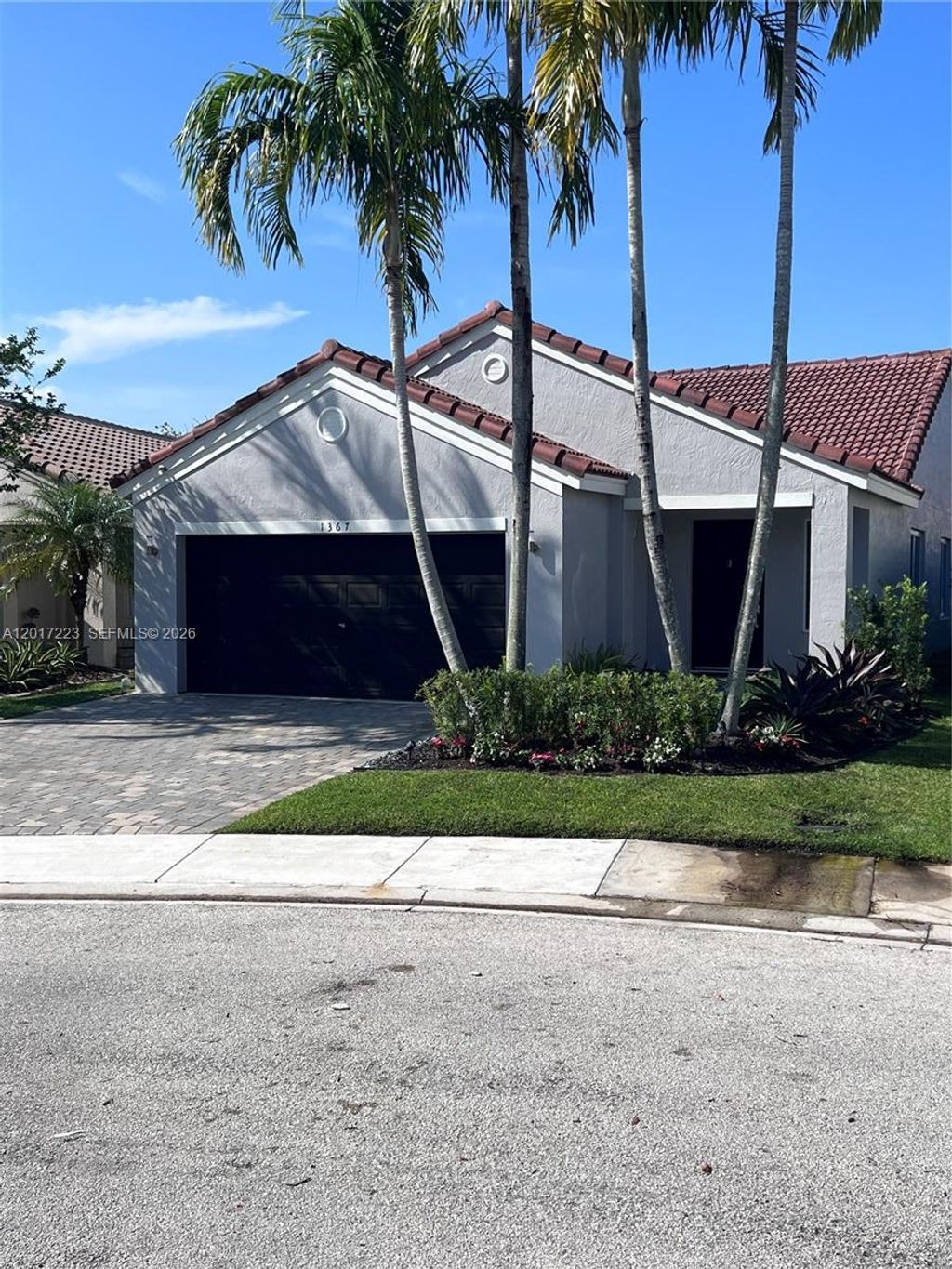 Photo of 1367 Plumosa Way, Weston, FL 33327 (MLS # A12017223)