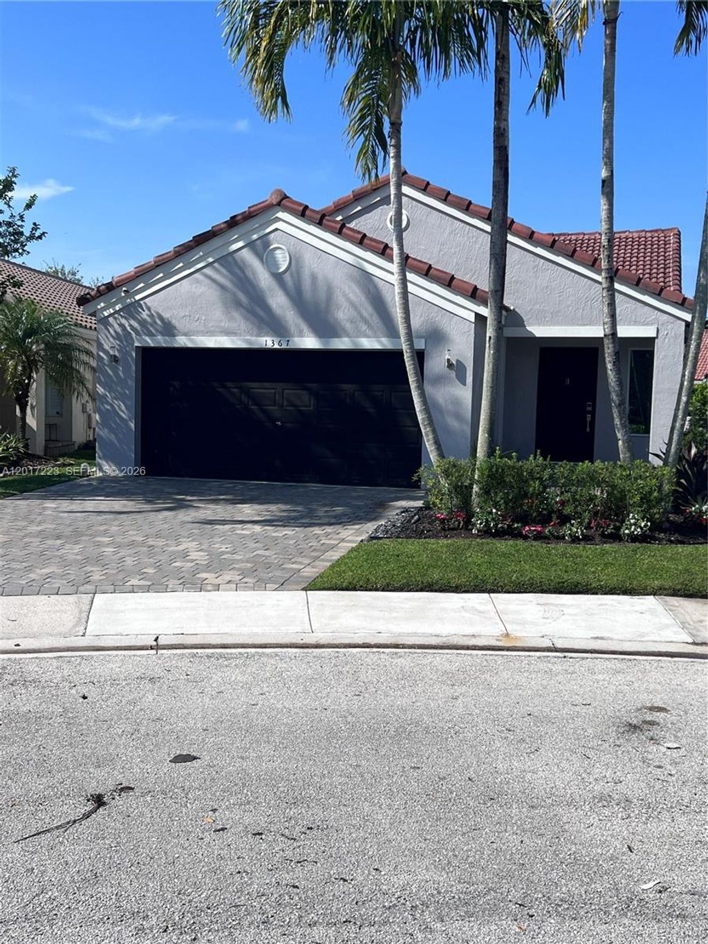 Photo of 1367 Plumosa Way, Weston, FL 33327 (MLS # A12017223)