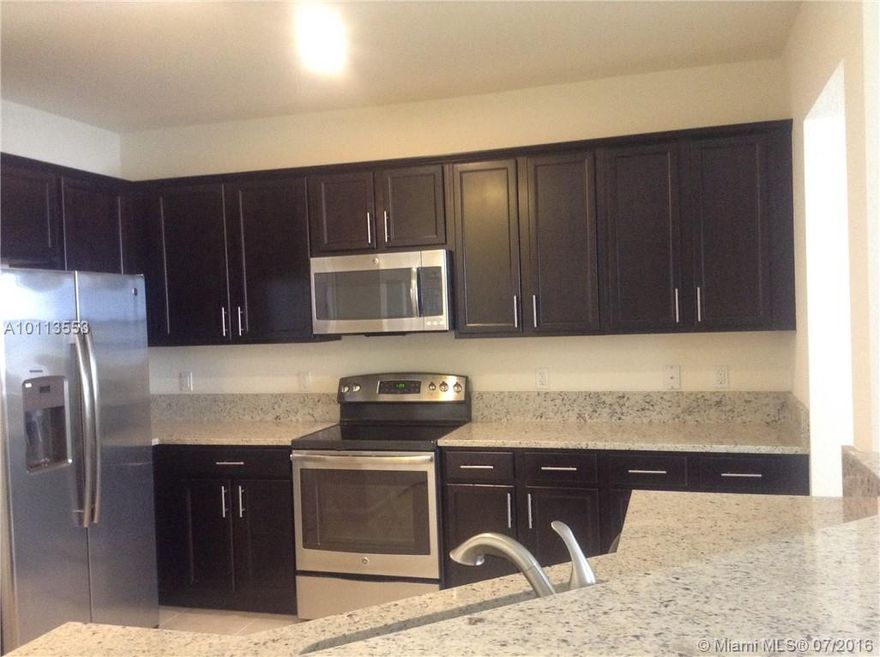 All new! Excellent location in front of Ronald Reagan High school, ADAGIO at Doral, granite countertops, new stainless steel appliances and more