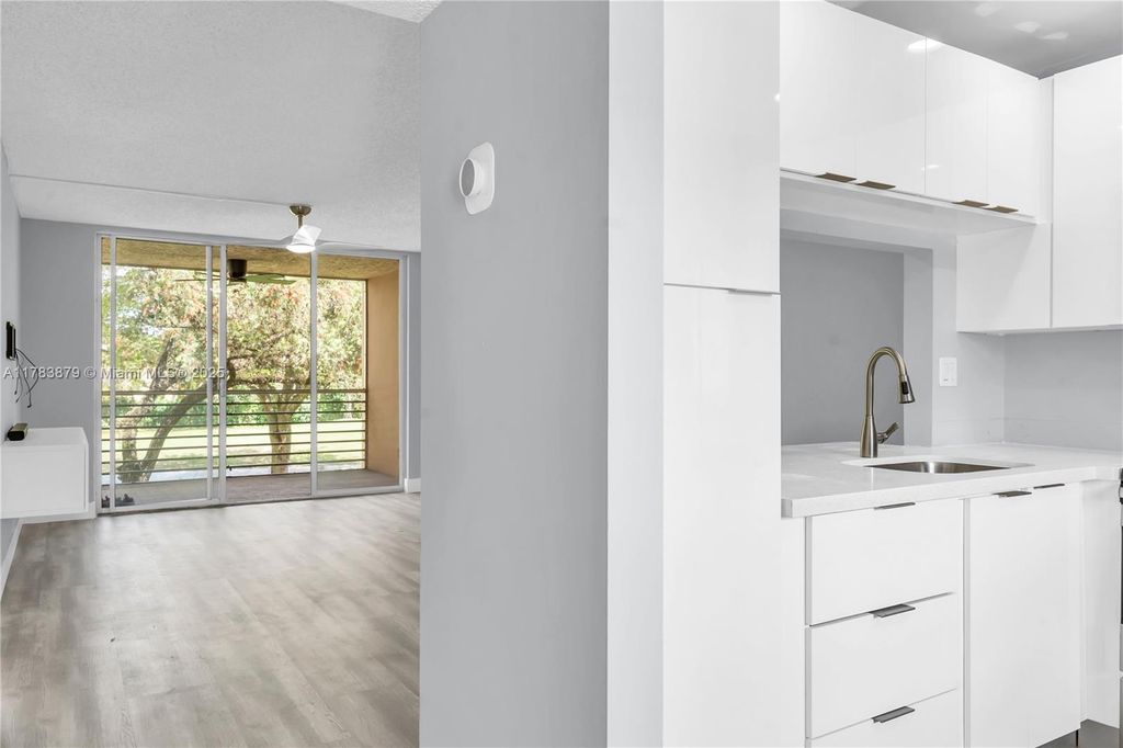 Photo of 9460 Tangerine Pl #202, Davie, FL 33324 (MLS # A11783879)