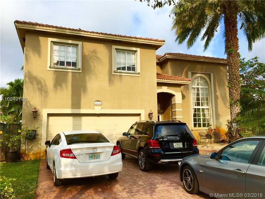 BEAUTIFUL 4BED/3BATH HOME IN THE HEART OF MIAMI LAKES. SITTING ON AN OVERSIZED LOT WITH OVER 3400 SQ FT OF LIVING SPACE WITH DOUBLE VOLUME CEILINGS, THIS HOME OFFERS A MASTER SUITE & RENOVATED KITCHEN WITH GRANITE COUNTER TOPS, WOOD CABINETRY, & SS APPLIANCES. TASTEFULLY TILED ON THE 1ST FLOOR AND LAMINATE FLOORS UPSTAIRS, THIS HOME IS ALSO OFFERS A CIRCULAR BRICK PAVED DRIVEWAY, CEMENTED BASKETBALL COURT & COVERED PATIO OVERLOOKING THE HOMES WONDERFUL POOL AREA & TIKI HUT!